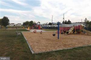 Lehr park playground - ground view of two playgrounds and swings